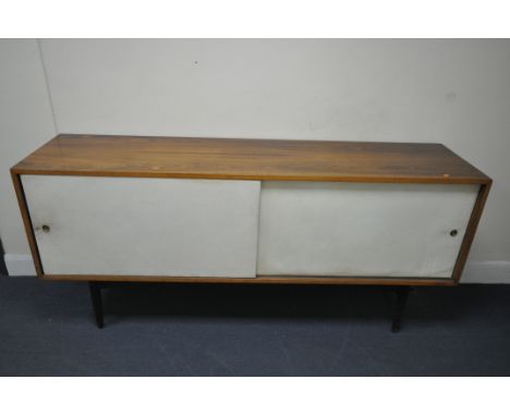 ROBIN DAY (1915-2010) FOR HILLE, A MID-CENTURY ROSEWOOD SIDEBOARD, the double white sliding doors enclosing one side that hou