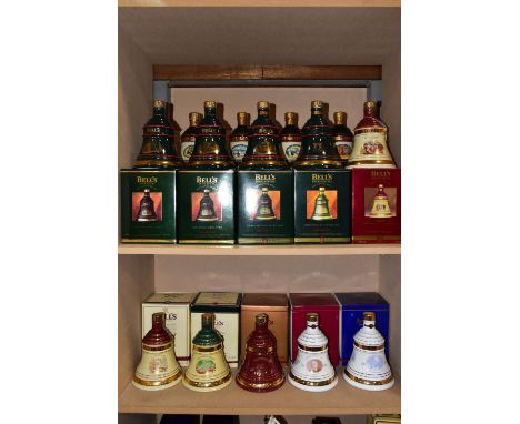 BELL'S WHISKY_ 'CHRISTMAS DECANTERS' fourteen  Porcelain Decanters of Bell's Extra Special Old Scotch Whisky, 'Christmas' edi