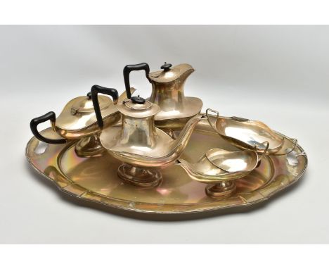 A GEORGE V SILVER FIVE PIECE TEA SET ON OVAL TWIN HANDLED TRAY, the set of oval / Aladdin's lamp style comprising tea pot, co