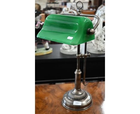 A 1920s style adjustable banker's lamp with green glass shade, 50 cm high