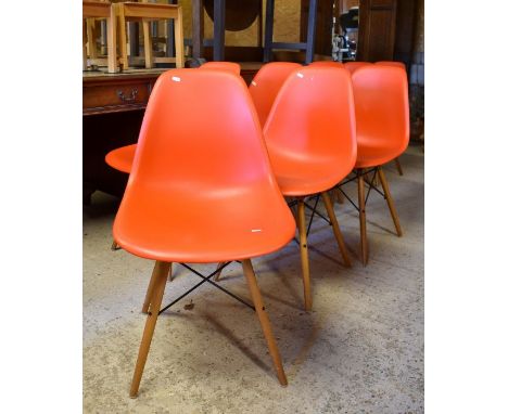 A set of eight Vitra Eames design (DSW) dining chairs, orange polypropylene shell on light maple legs (8)&nbsp;- very good us