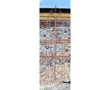 A trio of weathered steel arrow-head obelisks, approx 210 cm h x 35 cm dia