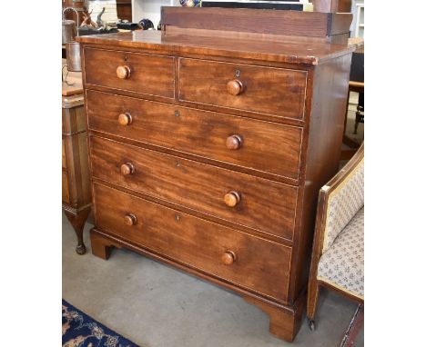 A Victorian mahogany chest of two short over three long drawers with turned handles and shaped bracket feet, 104 cm wide x 46