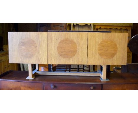 A light ash media cabinet or sideboard with three cupboard doors, 150 cm w x 40 cm d x 60 cm h&nbsp;