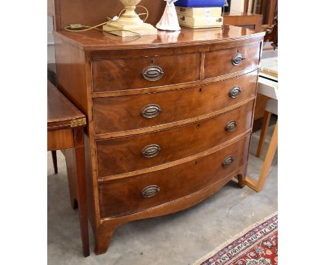A 19th century mahogany bowfront chest of two short over three long drawers on splayed bracket feet, 105 cm wide x 53 cm deep