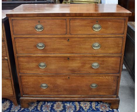 A 19th century mahogany chest of two short over three long drawers with brass handles, raised on bracket feet, 108 cm wide x 