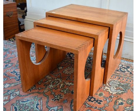 A graduated nest of three Danish teak tables by Jens Quistgaard for Nissen, the largest 50 cm x 37 cm x 25 cm&nbsp;- good and