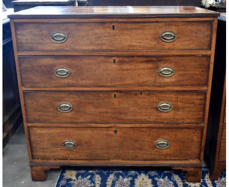A 19th century mahogany chest of four long graduating drawers with brass handles, raised on shaped bracket feet, 110 cm wide 
