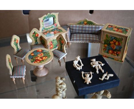 A suite of doll's house furniture decorated with fruit to/w three Chinese carved bone articulated acrobats&nbsp;- good apart 