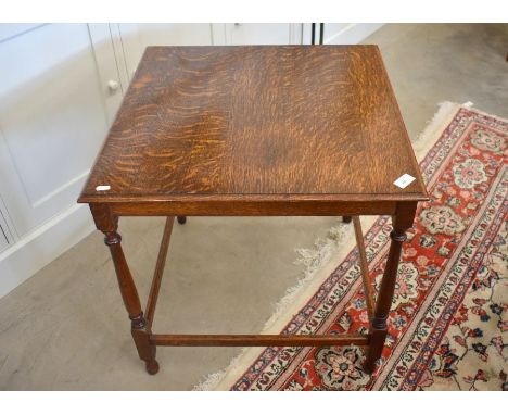 A square oak lamp table on slender turned supports united by stretcher, 60 x 60 x 60 cm&nbsp;