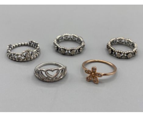 5x pandora rings, 1x rose stone set flower ring, 1x c2 heart tiarra, 1x heart tiarra, 2x c2 bands, 13.3grm