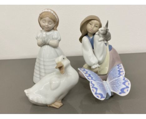 4x Nao by Lladro figures includes 1466 bunny’s best friend, 1553 my first communion, 1464 Gentle lavender and Nao goose All w