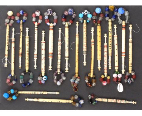 A collection of twenty three spot inscribed bone lace bobbins, girls names comprising Emma x 2 / Lucy / Emily / Emley / Jane 