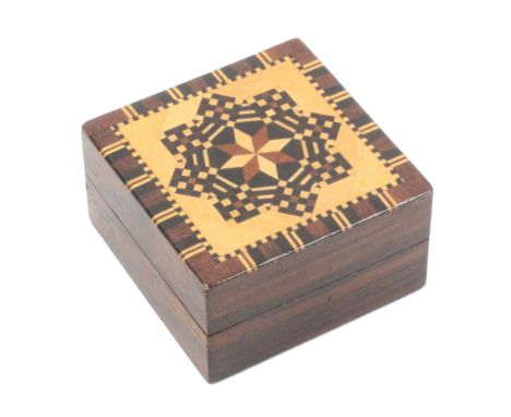 A rosewood Tunbridge ware stamp box by Edmund Nye, of square form, the lid with eight pointed star in mosaic and stick ware, 