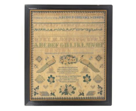 A sampler, the name and date indistinct but probably 1854, worked with rows of alphabets over a panel with two verses below a