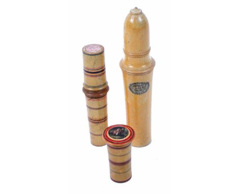 Three whitewood Tunbridge ware sewing accessories, comprising a cylinder case with internal reel and needle case, the top fit