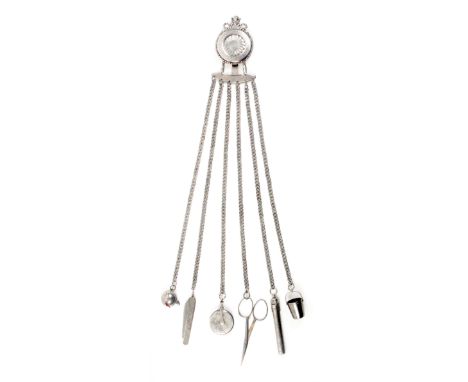 A good polished steel and etched chatelaine, the circular flower head hook mount with cut steel cresting and floral etched bo
