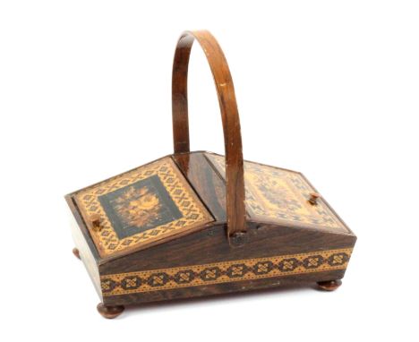 A small Tunbridge ware rosewood sewing pannier, raised on bun feet the sides with a band of geometric mosaic, the two sloping
