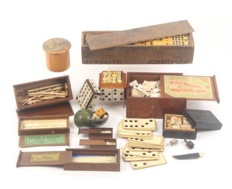 Dominoes and other games, comprising bone dominoes in domino square form box, 7cms, another set in pine sliding lid box, 28cm