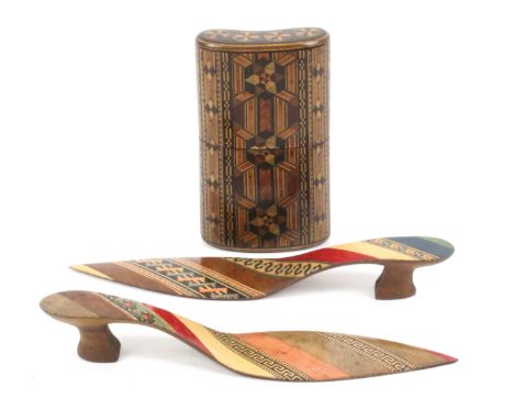 An elaborately inlaid cheroot case and two Sorrento ware paper knives, the cheroot case of curved form with colourful Tunbrid