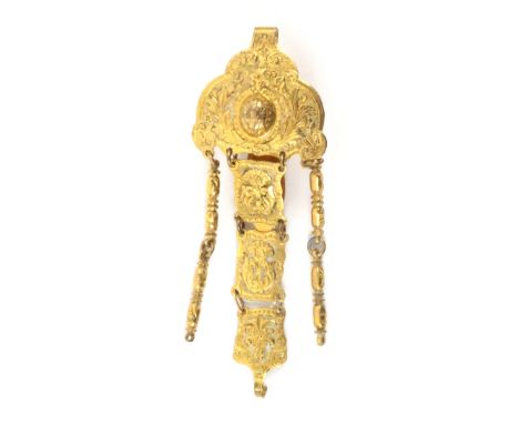 A late 18th Century gilt metal chatelaine, the shaped hook mount chased with leaves, flowers and scrolls centred by a raised 