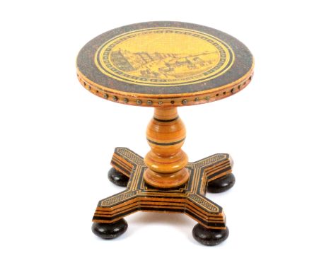 A painted, simulated rosewood and print decorated early Tunbridge ware pin wheel table, the circular top with colour print ti