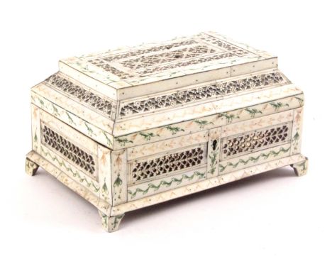 A Russian bone veneered, fretwork and engraved ‘Kholmogory’ casket, late 18th Century, the whole with pierced panels over foi