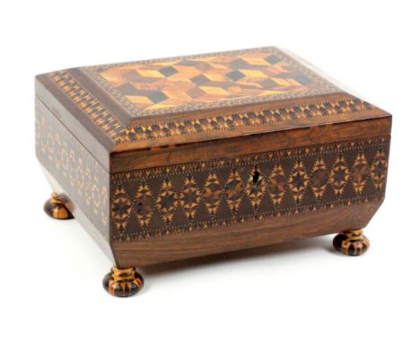 A good example of a rosewood Tunbridge ware fitted sewing box of sarcophagol form, circa 1838, the canted lid in cube work wi