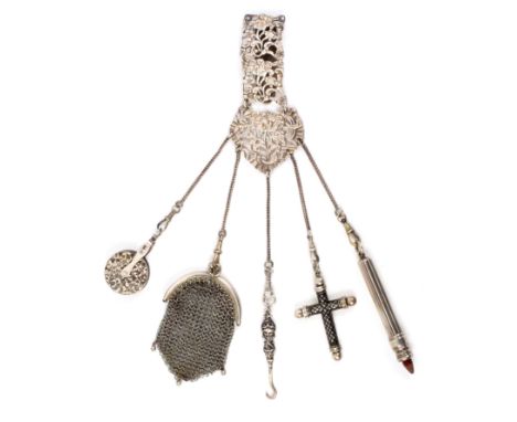 A Victorian silver chatelaine, the hook with pierced floral and ‘C’ scroll triple mount, marked with young QV head and date l