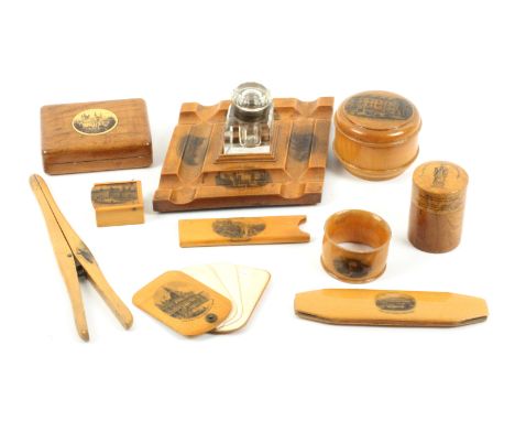 Mauchline ware, ten pieces, comprising an ink stand, the diamond form base complete with conforming ink well, (Cambridge view