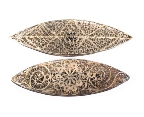 Two silver filigree shuttles, comprising an example with central flowerhead within quill work scrolls to both sides, long ova
