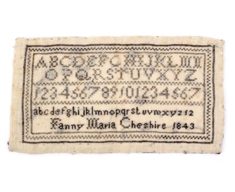 A miniature sampler ‘Fanny Maria Cheshire 1843’, worked in cross stitch with rows of alphabets and numerals within zig zag an