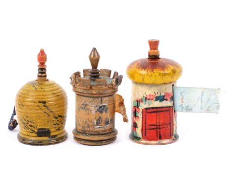 Three whitewood paint decorated Tunbridge ware tape measures, comprising a turret form example, paint worn, repairs to crenul