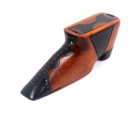 A large fruitwood and part dark stained shoe form snuff box, the sliding lid with ‘hour glass’ stained panel outlined in bras