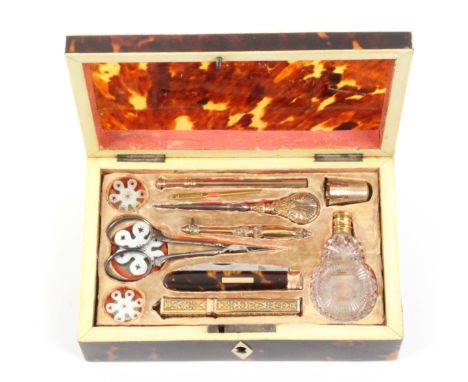An English tortoiseshell and ivory mounted fitted small format sewing box with French Palais Royal tools, circa 1820, of rect