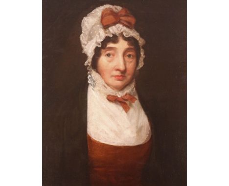 Circle of Sir Thomas Lawrence Portrait of a lady, half length, with a white bonnet and russet bow Oil on canvas 61 x 49cm; 24