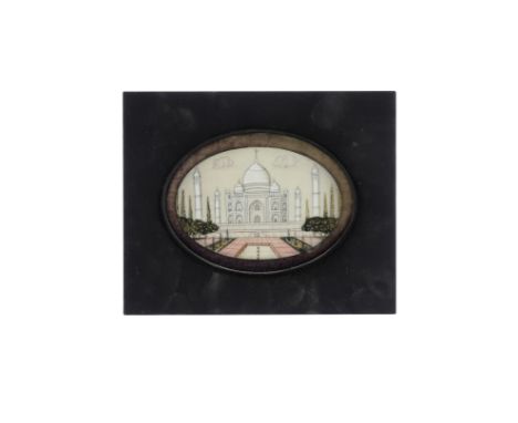 λ Indian School c.1900 Three miniatures of the Taj Mahal Each oval, in easel frame Largest 6.5 x 9.6cm; 2½ x 3¾in Together wi