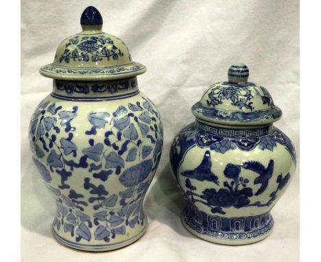 Two Chinese blue and white lidded jars with bird and floral decorations, tallest H: 28 cm, no cracks or chips. P&amp;P Group 