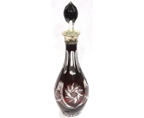 Ruby cut glass decanter with stopper, having a hallmarked silver collar, overall, H: 35 cm. P&amp;P Group 3 (£25+VAT for the 