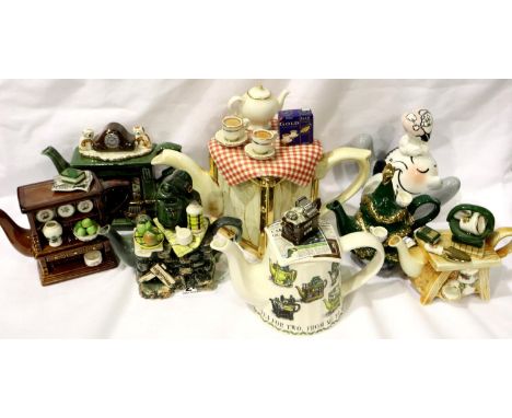 Eight small Paul Cardew teapots, tallest H: 13 cm. Chip to lid of one, two have reglued lids, otherwise good condition. P&amp