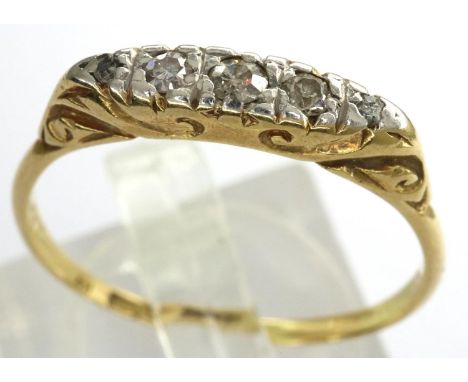18ct gold ring set with five diamonds, slightly off round, size P/Q, 2.1g. P&amp;P Group 1 (£14+VAT for the first lot and £1+