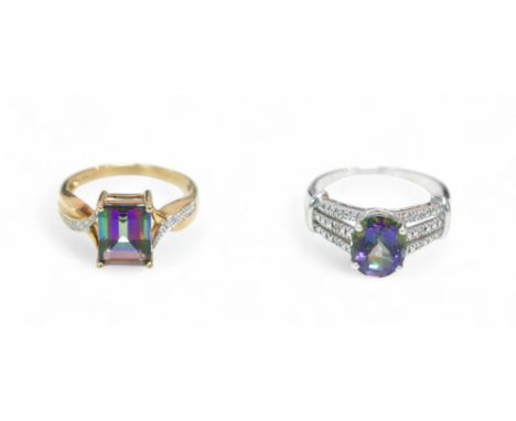 Two mystic topaz rings; one 9ct gold band with rectangular stone and diamond chips to the shoulders, size Q, the other with c