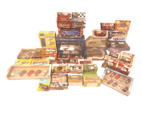 A group of thirty two die cast classic cars and modern cars. (2 boxes) 