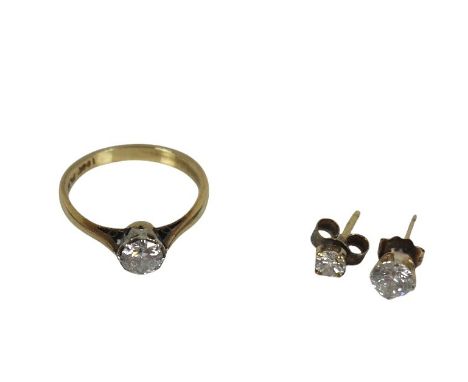An 18ct gold and platinum set diamond solitaire ring, size J, plus two diamond stud earrings (not a pair).