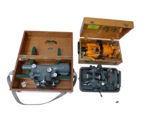 A Hilger &amp; Watts surveyor's level SL5, circa 1960, s no.101319, in wooden case, a Hilger &amp; Watts theodolite in metal 