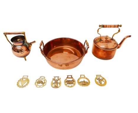 A collection of copper and brassware comprising a copper kettle designed by Christopher Dresser (1834-1904) for Benham &amp; 
