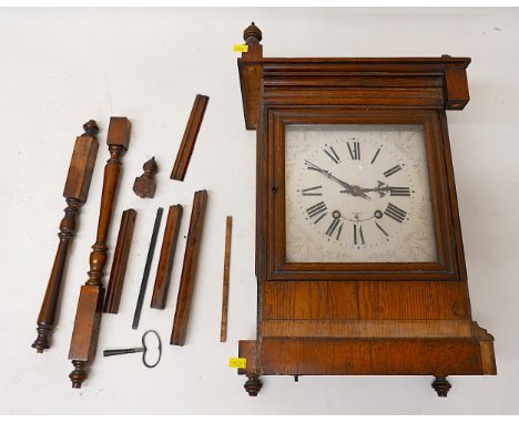 A late Victorian oak musical table clock with a fusee chain driven movement chiming on eight bells, striking on a single gong