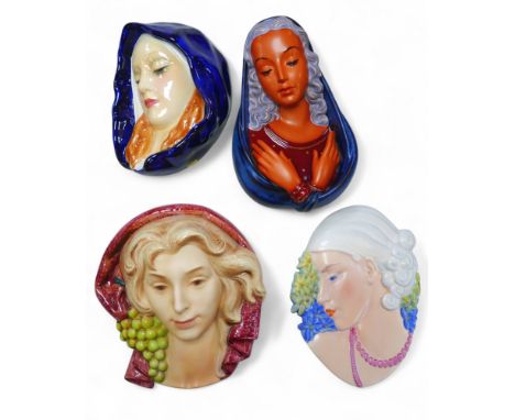 Four various Deco style wall plaques styled as female faces, including a Beswick plaque with blonde haired lady's head in pro