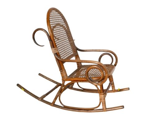 A bamboo Childs rocking chair with cane seat and back, 37 by 76 by 66cm high.