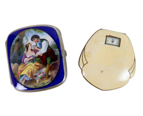 An Elgina ladies compact with watch and an Alpaca white metal cigarette case with lovers decoration, 9 by 1 by 8cm.(2)